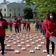 Illustration for article titled Nurses Honor Fallen Colleagues Outside of White House, Protest for PPE: ‘We Are Not Getting What We Need’